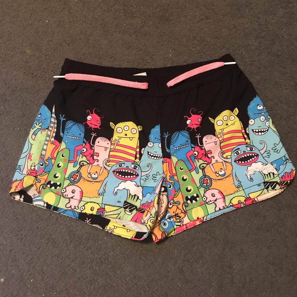 Monster print swim shorts